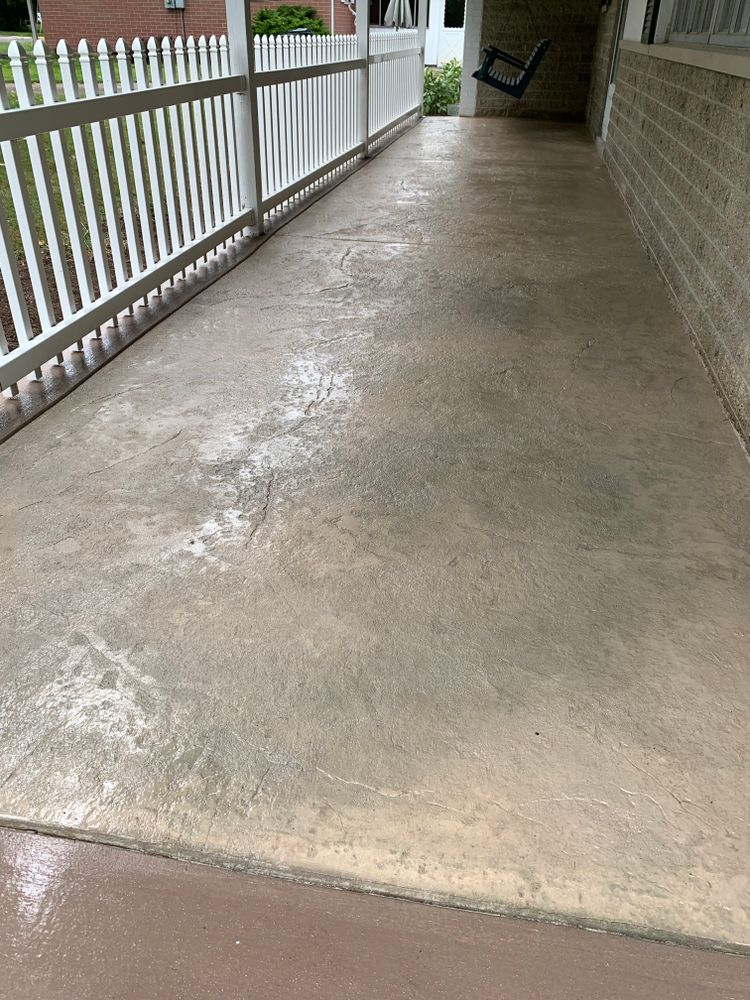 Our Front Porches service offers homeowners the opportunity to enhance their outdoor space with durable and stylish concrete structures, creating a welcoming entrance that adds value and curb appeal to their home. for G&A Contracting, LLC  in Germantown, OH