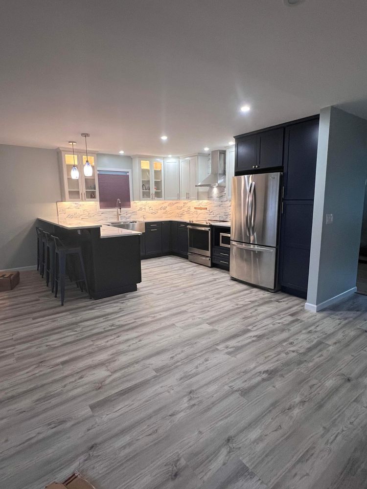 Our Kitchen Renovation service offers homeowners a transformative experience, from concept to completion. Enhance the heart of your home with our skilled craftsmen and high-quality materials for a stunning result. for Blue Line Home Renovations in Middle Island, NY