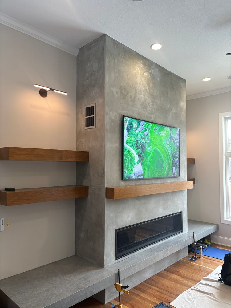 Interior fireplace & feature walls  for STAMPEDE Vertical Concrete in Isanti, Minnesota