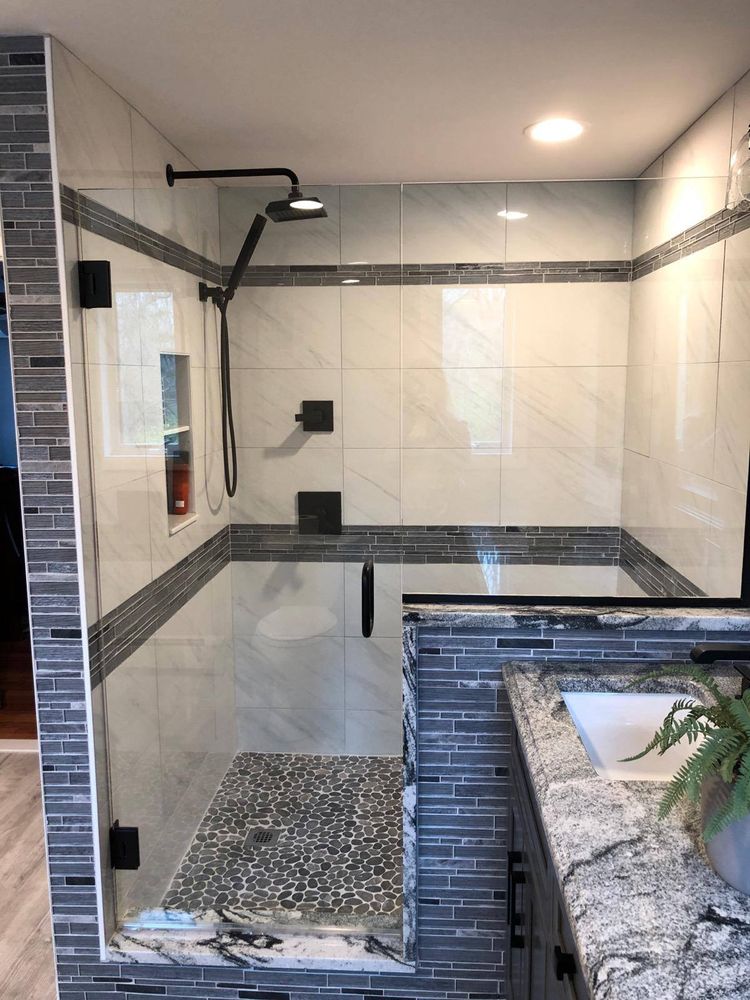 Transform your outdated bathroom into a beautiful and functional space with our expert Bathroom Renovation service. From modern fixtures to luxurious finishes, we'll bring your vision to life. for Garcia Home Improvement & Remodeling LLC in Seekonk, MA