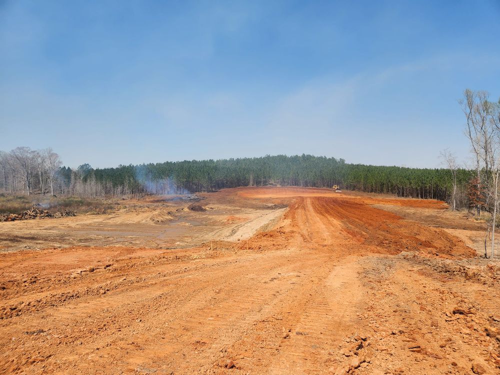 Our Leveling service ensures your land is precisely graded for construction, promoting stability and preventing drainage issues. Trust our experts to create a solid foundation for your next home project. for Tri Services in Milledgeville, GA