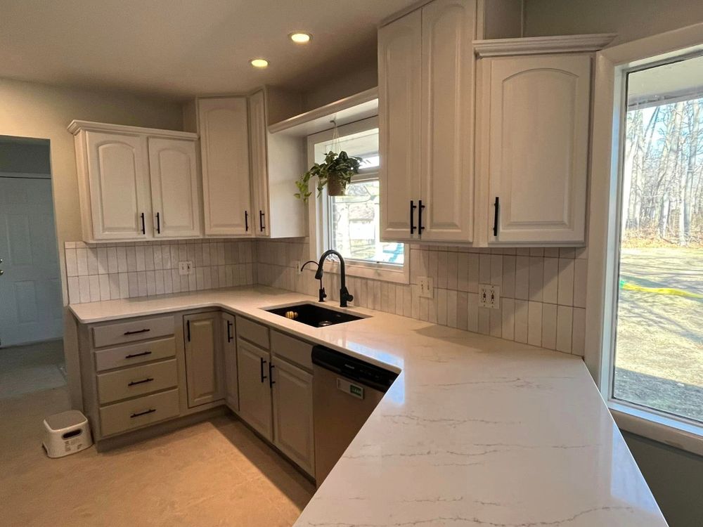 Revamp your kitchen with our expert renovation service. We specialize in creating functional and stylish spaces that cater to your unique needs, enhancing the heart of your home. for Chapman Surfaces Tile & Remodeling in Milan, MI