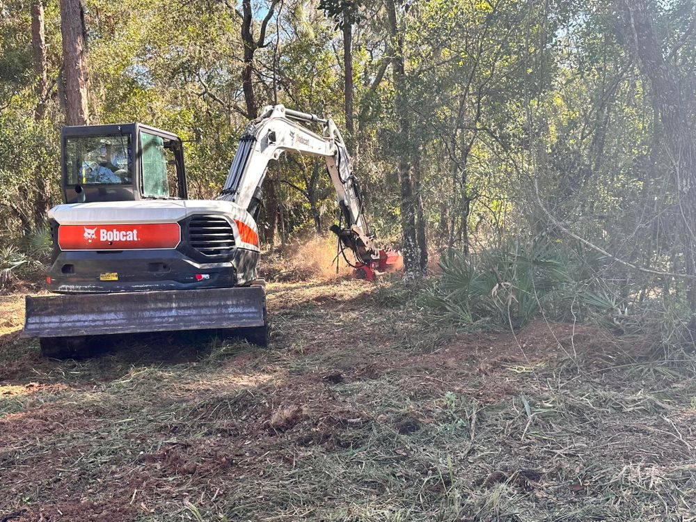 Our Bobcat Services efficiently handle excavation, grading, and landscaping projects for homeowners, ensuring precision and safety. Trust our skilled operators to transform your property with professional attention to detail and reliable equipment. for Windspirit Land Services in Hillsborough County, FL