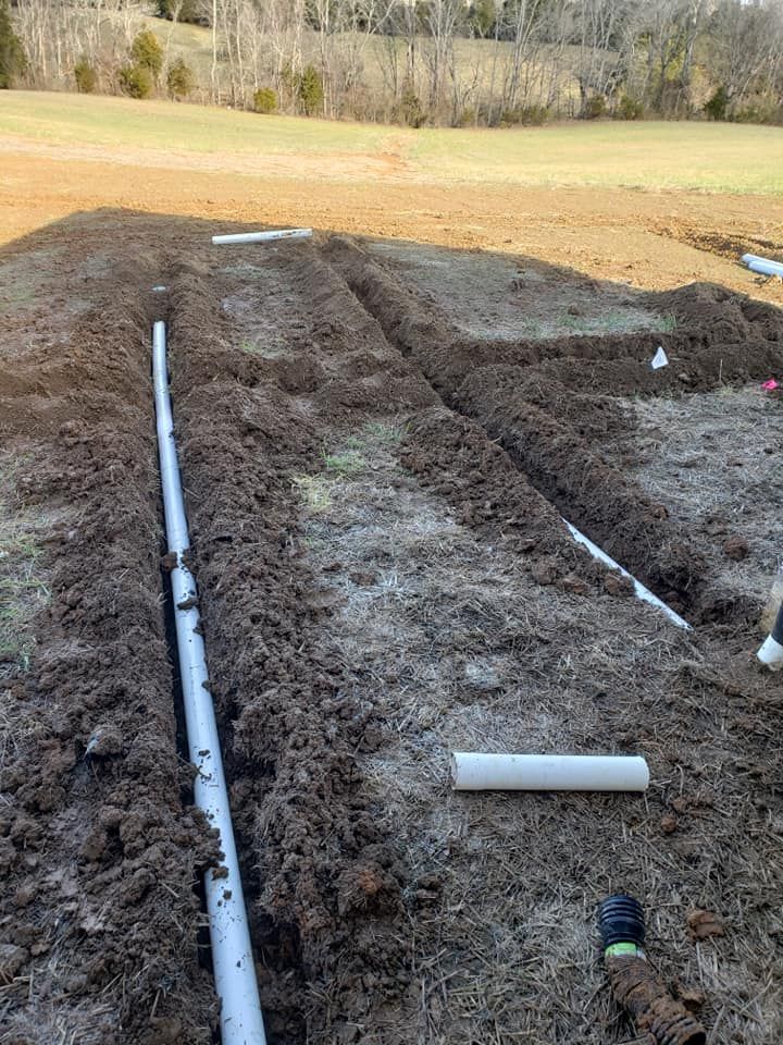 Our Solid Drain Install & Repair service efficiently handles drainage issues, ensuring your landscape remains healthy and properly irrigated by preventing water pooling with durable solutions tailored for long-term reliability and performance. for Brother's Irrigation & Lighting in Knoxville, TN