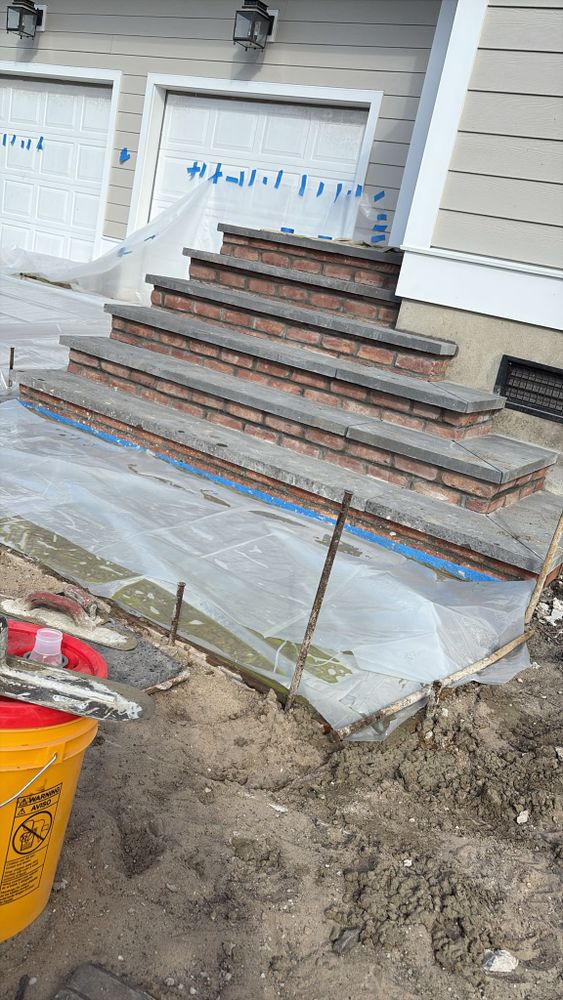 Enhance your home's elegance with our expert step installation services. We specialize in designing and installing beautiful, durable stairs that perfectly complement your property's unique style and architectural details. for Brayan ,The Boys Helps Masonry in Absecon, NJ