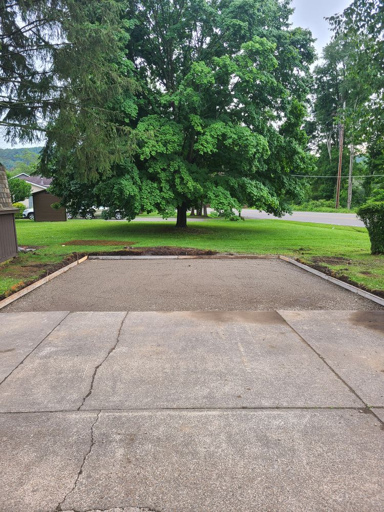 Our Leveling service ensures your property is properly graded and prepared for construction, creating a sturdy foundation for future projects. Trust us to level the ground effectively and efficiently. for Simz Excavating & Plowing LLC in Warren, PA