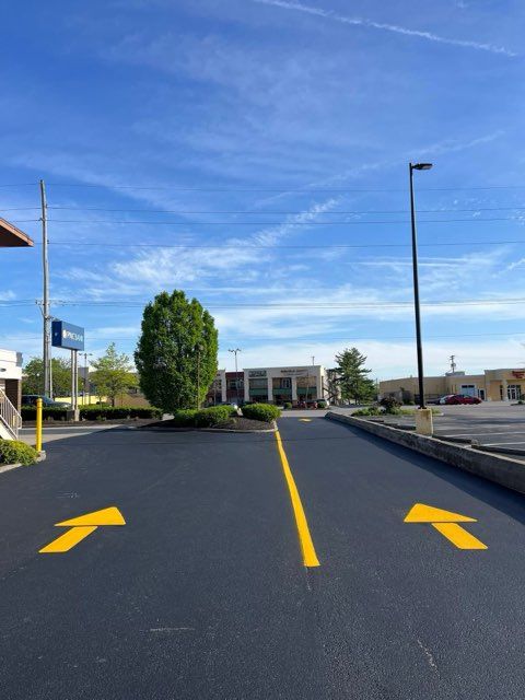 Enhance your driveway's appearance and safety with our professional parking lot striping, offering precise lines and durable results to ensure optimal organization and traffic flow for residential properties. for Metzler Paving and Sealcoating in Jacksboro, TN