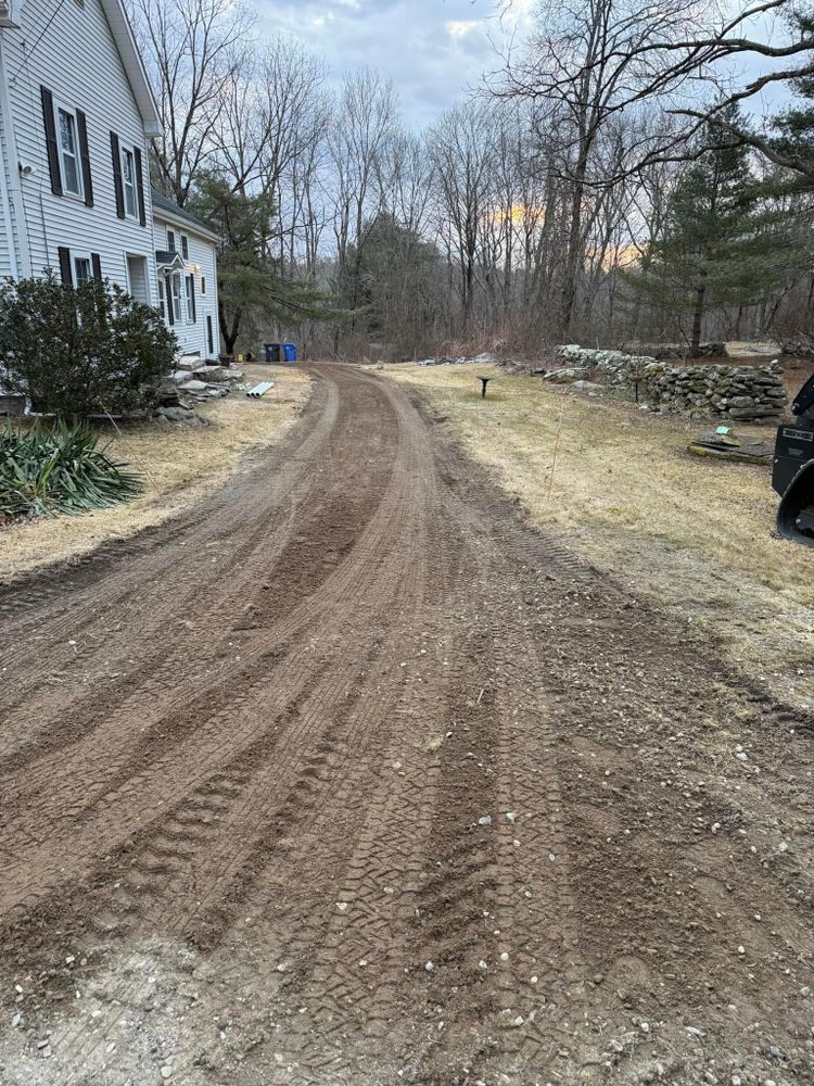 Gravel Driveway Regrading

Our Gravel and Milling Driveways service provides a durable and cost-effective solution, enhancing your home's curb appeal. Discover affordable driveway costs tailored to fit your budget without compromising quality. for Triple C’s Excavation in Ashford, CT