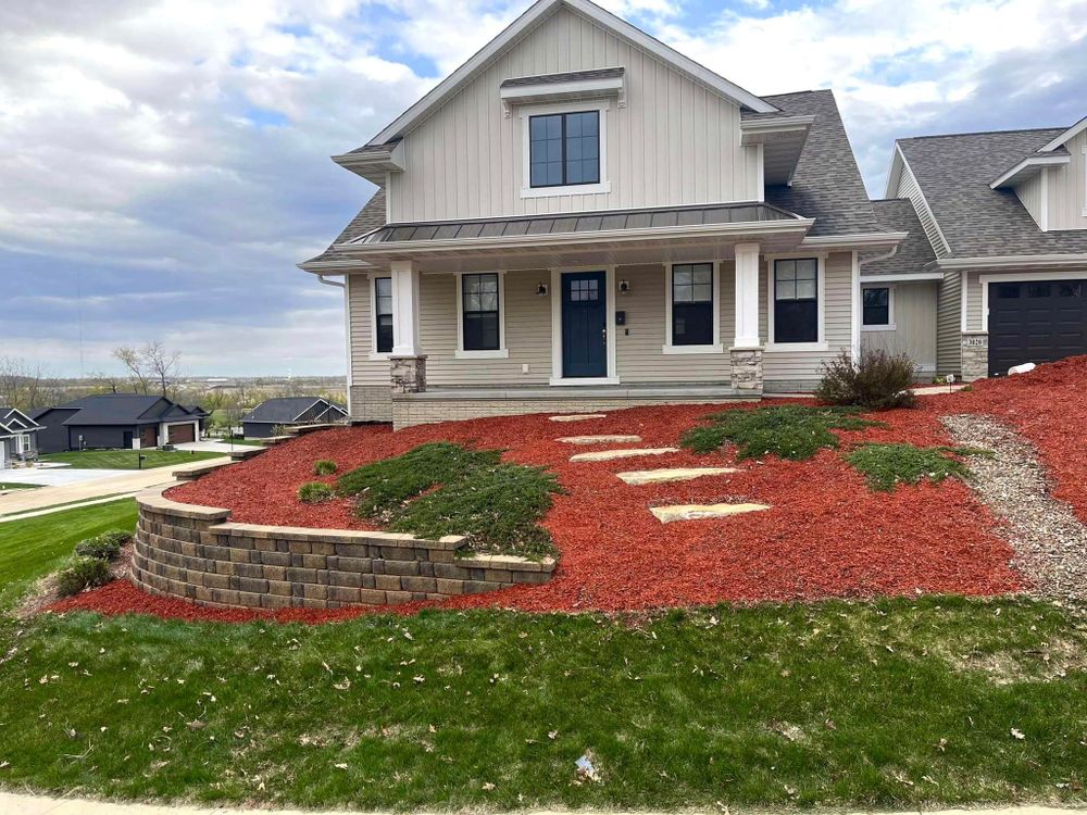 Transform your outdoor space with our professional landscaping service. From design to installation, we work with you every step of the way to create a beautiful and functional environment you'll love.

Service Types:
- Brick Edging
- Retaining Walls
- Flower Beds
- Patio Installation
- Brick Walkways
- Fertilization for Weeds Lawn Care & Landscaping LLC  in Hiawatha, IA