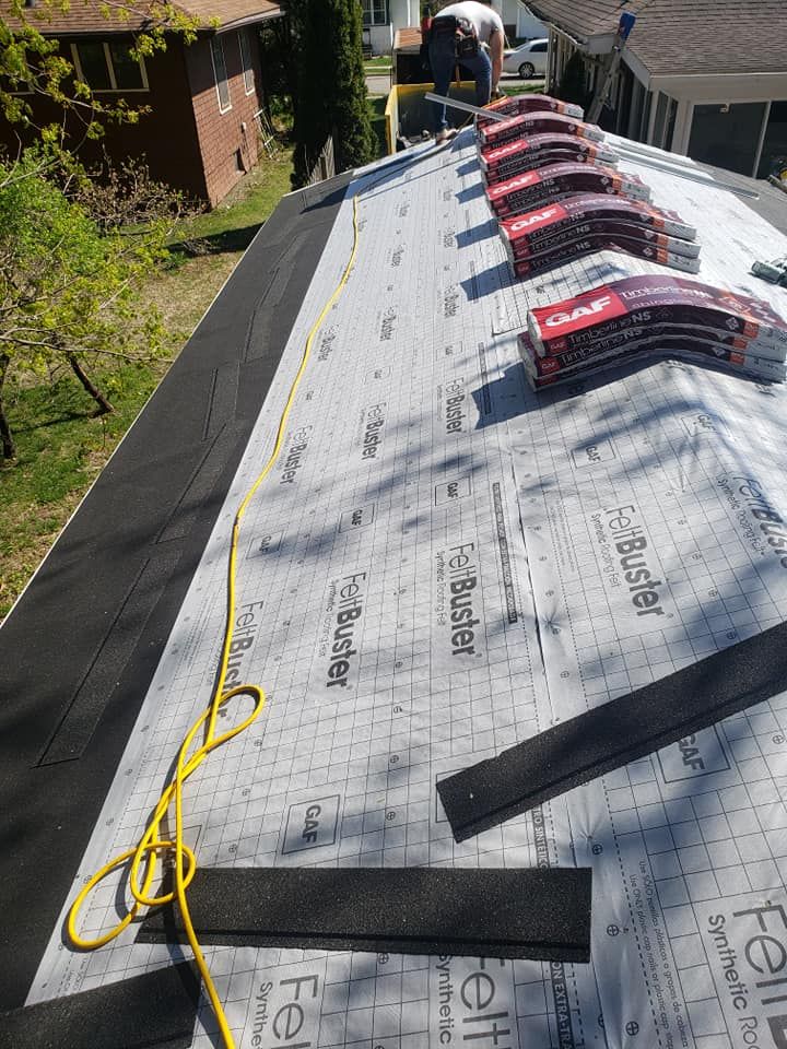 Roofing for Walkers Quality Roofing  in Midland, MI