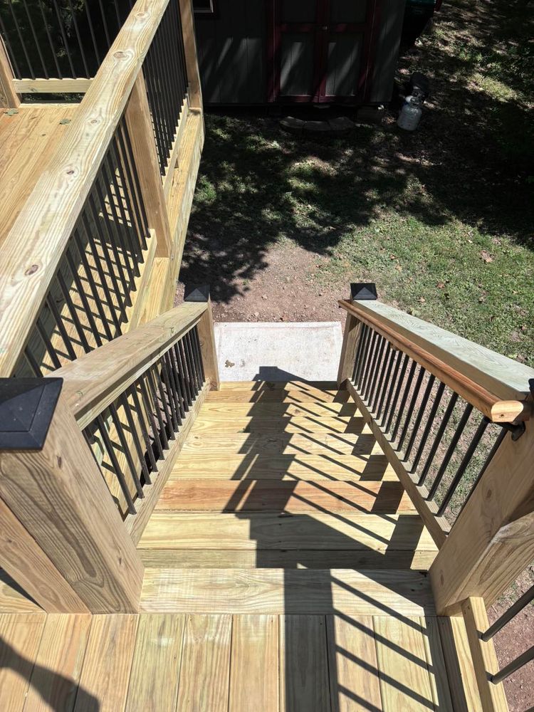 Our Deck Repairs service revitalizes your outdoor space by fixing structural issues, updating worn materials, and enhancing aesthetics to ensure safety and extend the lifespan of your deck for years to come. for Natural State Deck Builders in Pea Ridge, AR