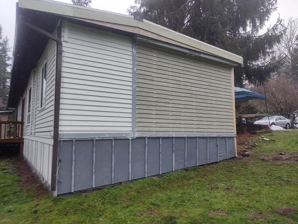 Enhance your home's value and comfort with our expert window installation, seamlessly complementing our deck & patio installation services to create a beautiful and efficient living environment. for Siding Doctor in Bonney Lake, WA