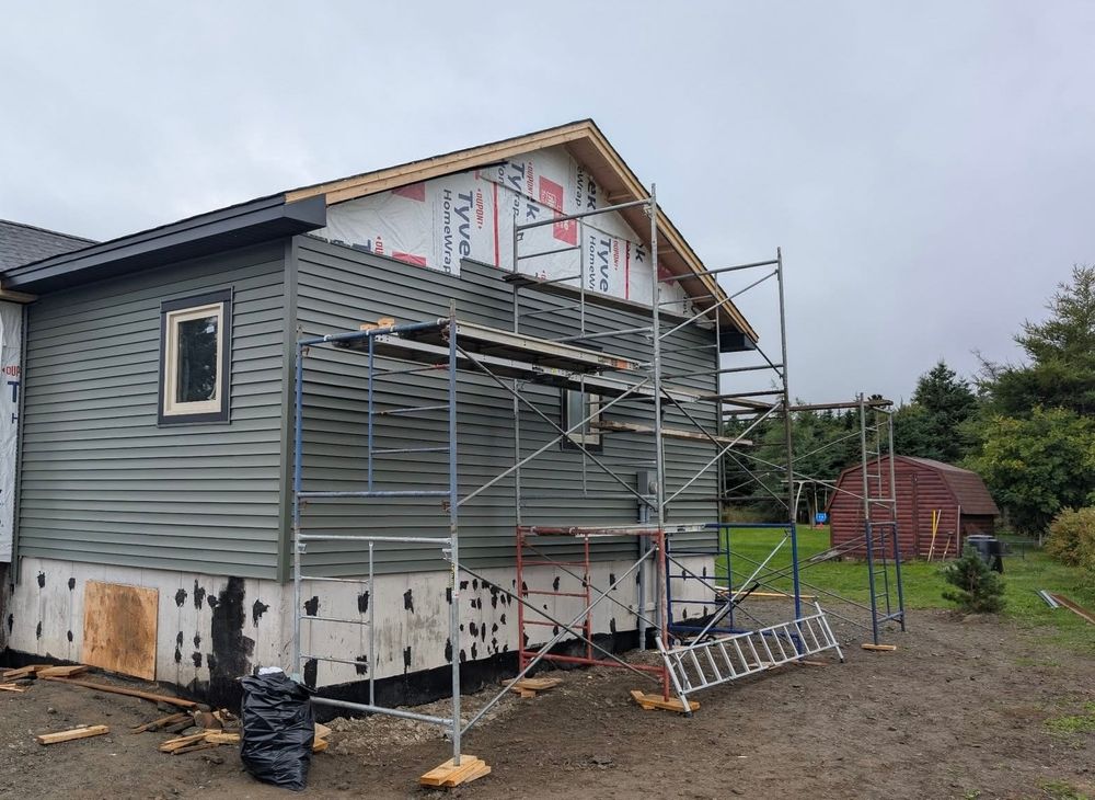 Enhance your home's curb appeal with our expert siding services, specializing in durable vinyl options that provide superior protection and energy efficiency for a stunning exterior transformation. for Boston Elite Roofing & Masonry in Boston, MA