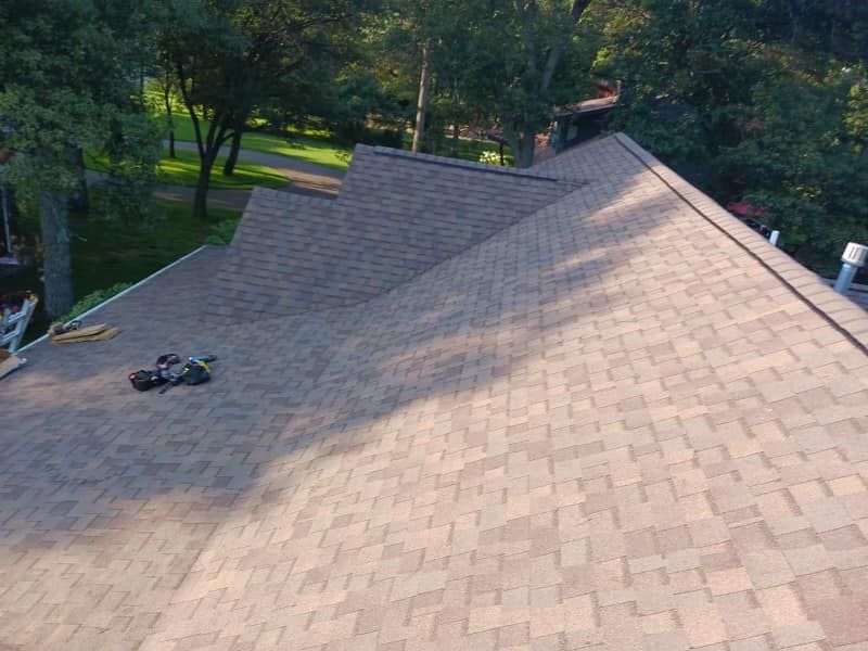 Our experienced team offers expert asphalt shingle roofing installation services for homeowners looking to enhance the durability and aesthetics of their roofs. Trust us for quality craftsmanship and reliable results. for Patriot Roofing Plus LLC in Pequot Lakes, MN