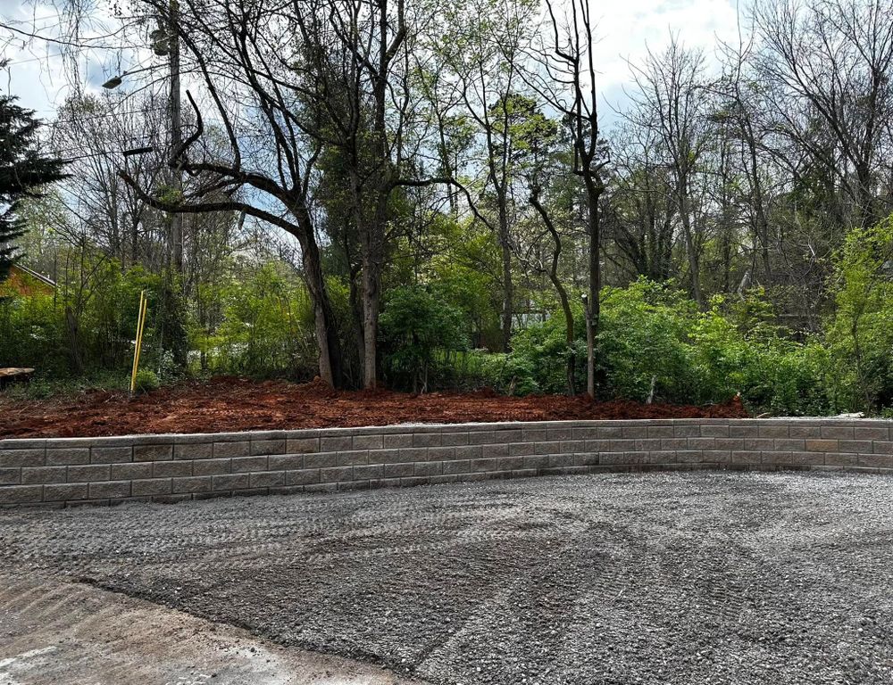Our retaining wall service builds strong, attractive structures that prevent erosion, manage sloped yards, improve drainage, and create usable outdoor spaces while enhancing your landscape’s beauty, function, value. for Wiles Lawn and Landscaping in Powell, TN