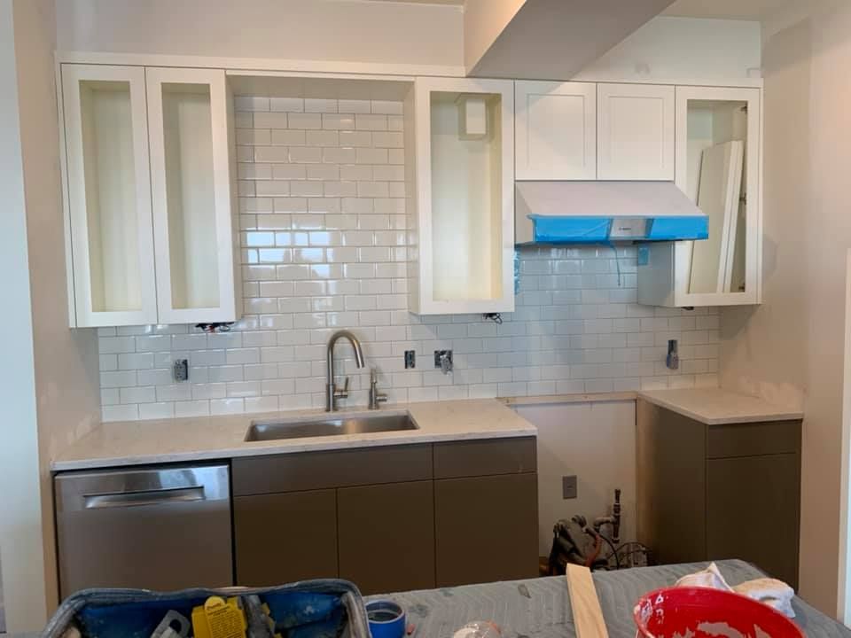 Enhance your kitchen's aesthetic with our expert backsplash tiling service, offering precision installation and a variety of stylish designs to elevate your space's look while ensuring durability and easy maintenance. for Moore Custom Tile in Gorham, ME