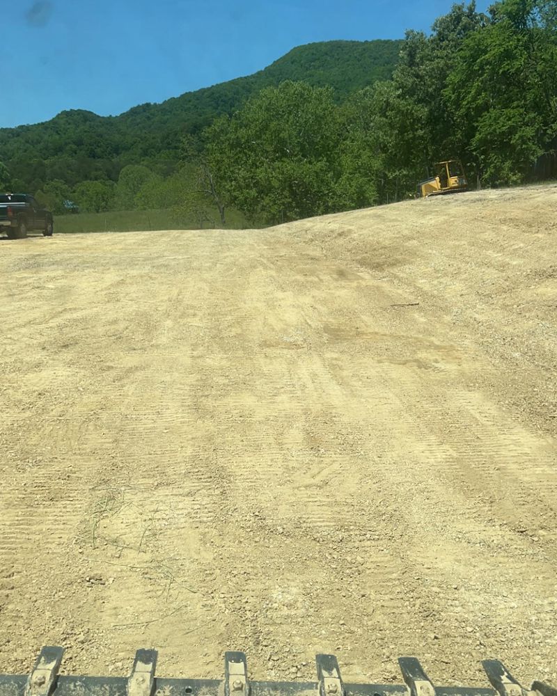 Our Site Development service transforms your property by expertly clearing, grading, and preparing the land for construction, ensuring a stable foundation and seamless integration with your home building plans. for Bernard’s Outdoor Services in Greeneville, TN