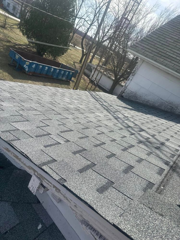 Our roofing repairs service ensures your home remains safe and secure by addressing leaks, damaged shingles, and other issues promptly with expert care, enhancing durability and extending your roof's lifespan. for Couchmans Home Improvements in Peru, IN