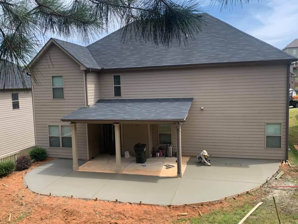 Our Patio Design & Installation service offers homeowners the opportunity to create a beautiful outdoor space by designing and installing customized concrete patios tailored to their needs and preferences. for Compadres Concrete in Griffin, GA