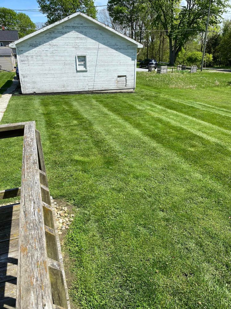 Our professional Lawn Aeration service helps improve the health and appearance of your grass by loosening compacted soil, allowing for better water and nutrient absorption for a lush green lawn. for OT Lawn and Landscaping LLC in Carey, OH