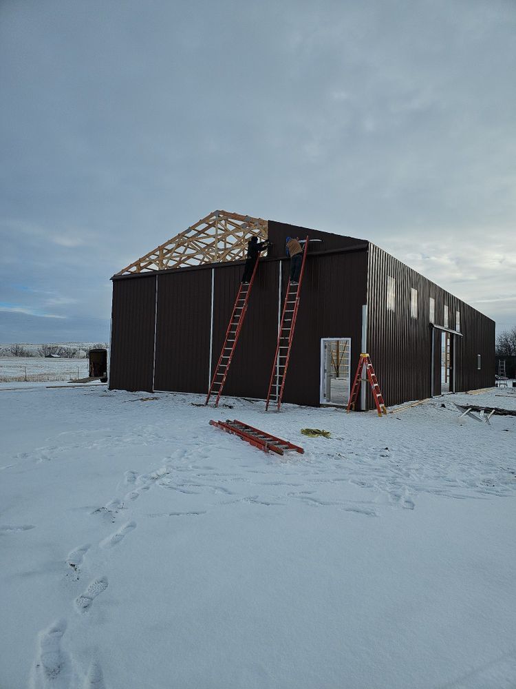 Our Pole Barn Construction service offers durable, customizable, and cost-effective building solutions for homeowners seeking additional storage or functional space. Trust our expert team to deliver quality craftsmanship tailored to your needs. for Blue Mountain Construction in Roundup, MT
