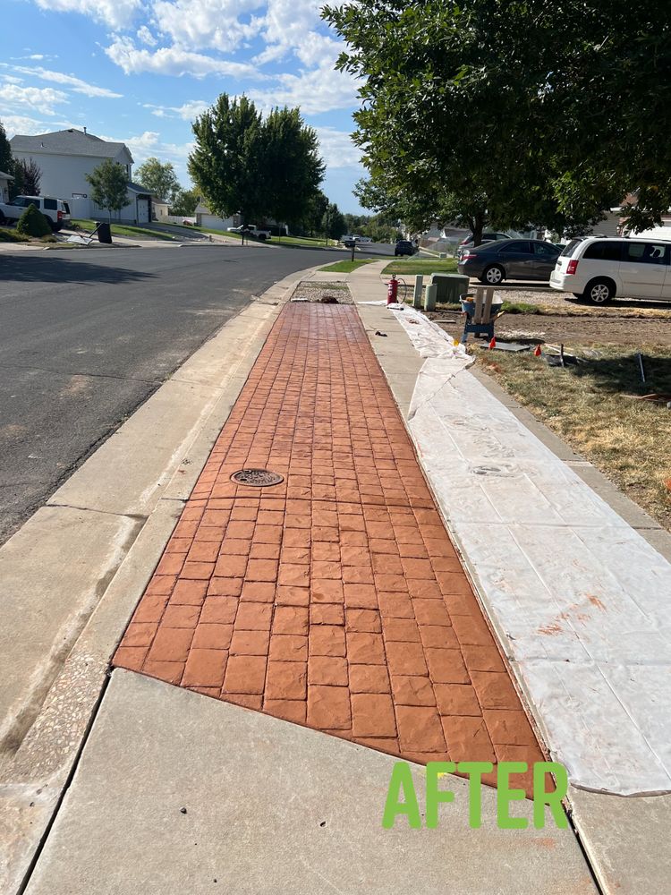 Enhance your home's appeal with our professional stamped concrete installation, offering durable and attractive surfaces that mimic natural stone, brick, or slate at a fraction of the cost. Transform your outdoor spaces today. for TNT Concrete and Construction LLC in Roy, UT