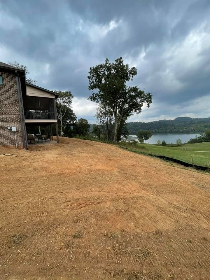 Our Land Grading service ensures a smooth, level surface for your property, improving drainage and foundation support. Trust our skilled team to prepare your land for landscaping or construction projects with precision. for Strange Excavating & Utilities in Lenoir City, TN