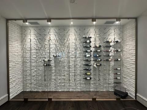 Our Wine Cellar Glass service covers the custom glass supply and installation — not the full cellar build. We crafts and fits frameless glass enclosures tailored to your space, turning your collection into a stunning focal point in your home. for Pristine Shower Doors in Adairsville, GA
