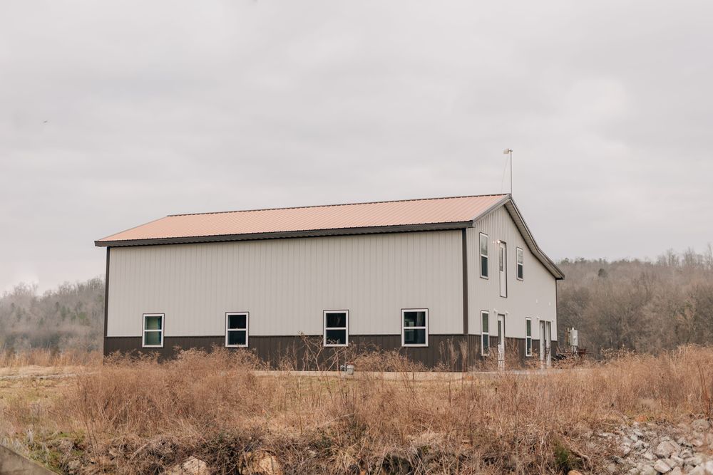 Our Barndominium Construction service offers homeowners the opportunity to create a unique living space combining the rustic charm of a barn with the modern durability of steel construction. for Lumen Constructions in Lobelville, TN