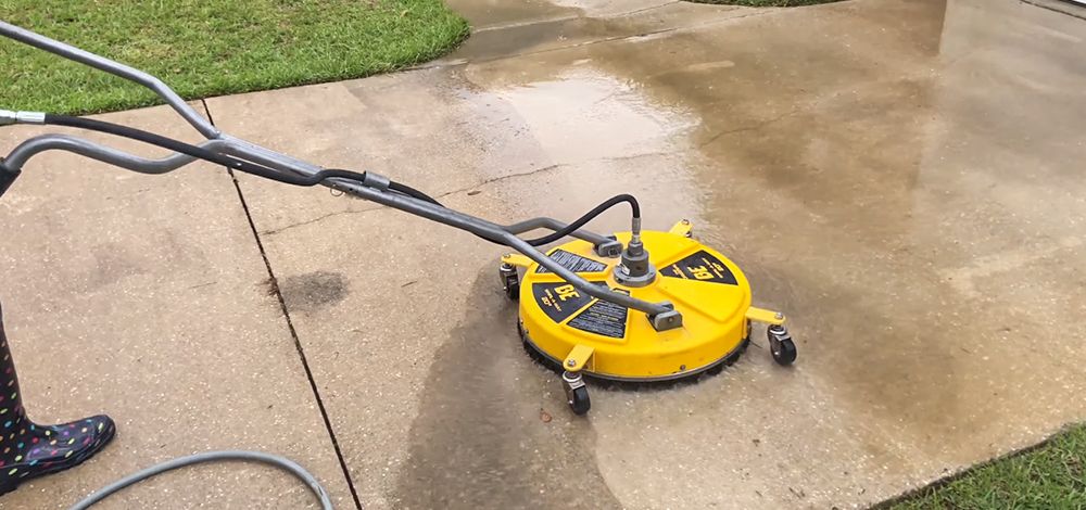 Our Driveway & Sidewalk Cleaning service utilizes power washing techniques to effectively remove grime, dirt, and stains from your home's exterior surfaces for a clean and appealing look. for Foreshore Pressure Cleaning Services Inc in Holiday, FL