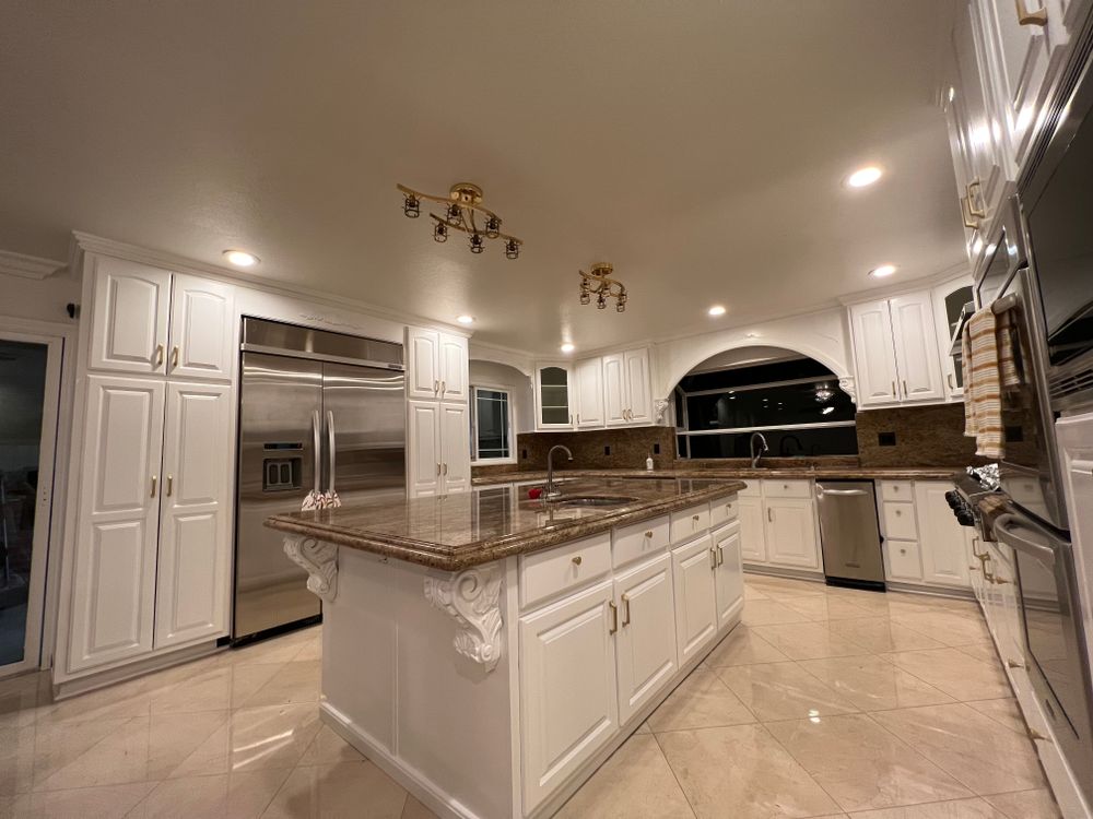 Transform your kitchen or bathroom with our expert cabinet painting and refinishing service, offering a cost-effective solution to refresh your space with a beautiful, durable finish that revitalizes any room. for A1 Painting Service in Anaheim, CA
