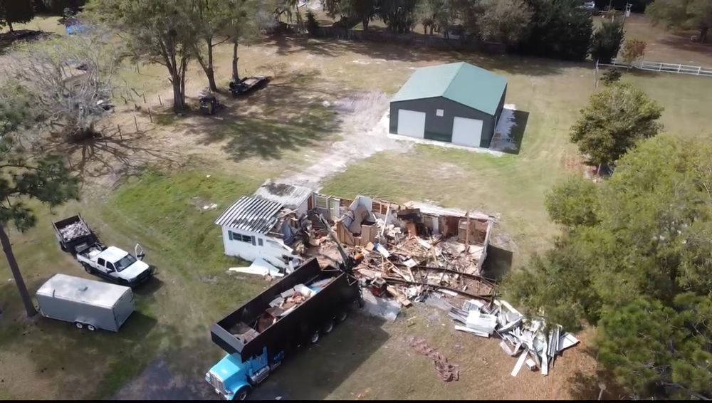 Our debris removal service helps homeowners clear their yards of rocks and trash to prepare for tree removal service, ensuring a clean and safe environment post-tree removal. for C & S Grading in Saint Cloud, FL