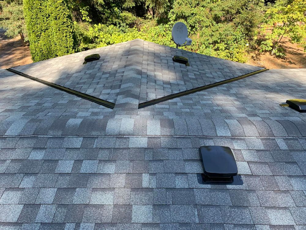 Our Roofing Replacement service offers durable materials and skilled craftsmanship to ensure a long-lasting, weather-resistant solution that enhances your home's value and protects your family from the elements. for FTG Builders Inc in Tacoma, WA