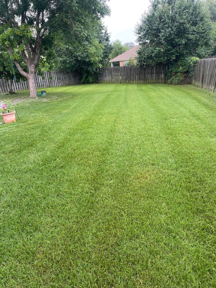 Our professional mowing service ensures a pristine, well-manicured lawn, enhancing your home's curb appeal. We offer regular maintenance with precision cutting and edging for a healthy and beautiful yard all season long. for Sparks Landscaping in Augusta, GA