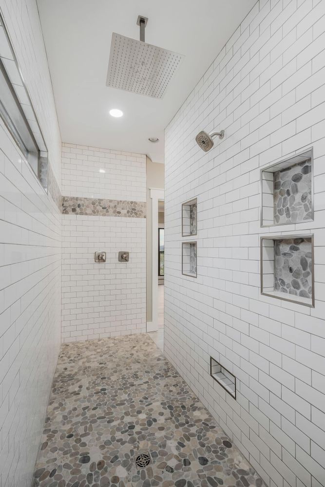 Enhance your new home with our custom tile showers, expertly crafted by skilled custom tile contractors​ to provide stunning, durable designs that perfectly match your style and elevate your bathroom experience. for B4 Construction LLC in Cookville, TN