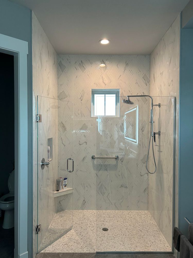 Transform your bathroom with our expert tiling service, offering precision installation, a wide range of styles and materials, and durable finishes to enhance beauty and functionality in your space. for Bravery Tile in Inverness, FL