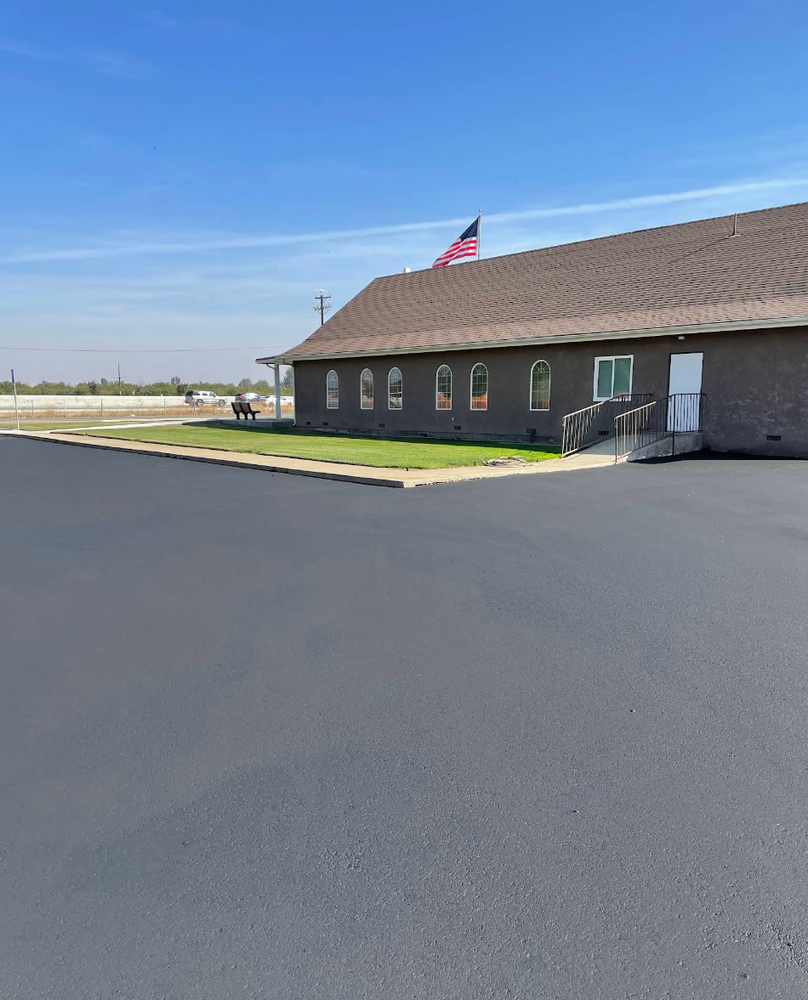 Enhance your driveway's durability and appearance with our sealcoating service. Protect against weather damage, prevent cracks, and extend the life of your asphalt with professional application for lasting results. for AGM Paving in Fresno, CA