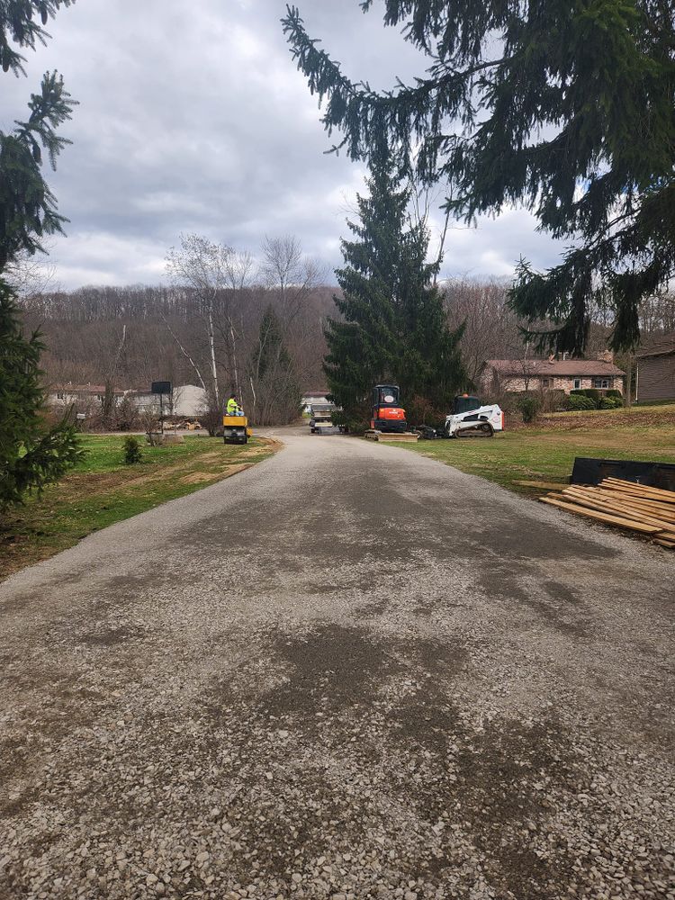 Our Roadbeds service ensures precise and stable foundation preparation for your construction project, ensuring long-lasting durability and safety for your home. Trust us to handle your excavation needs expertly. for Simz Excavating & Plowing LLC in Warren, PA