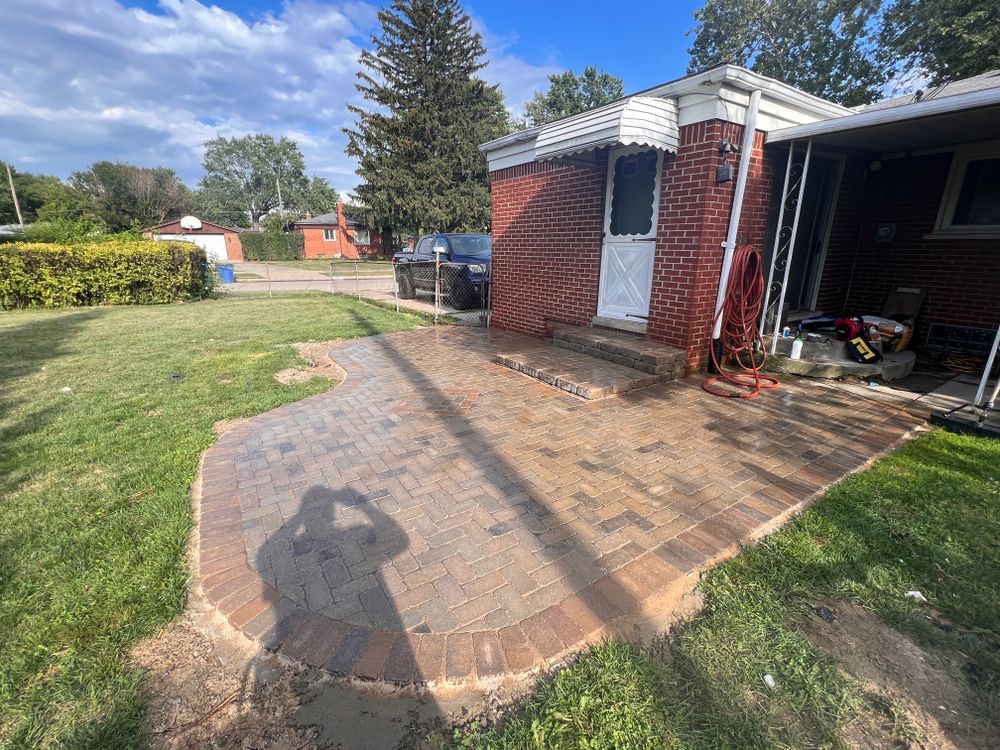 Our Paver Repair service ensures your outdoor spaces are safe and beautiful by fixing uneven or damaged pavers, restoring their original look while preventing further issues and enhancing curb appeal. for Alltimate Outdoor Services in Warren, MI