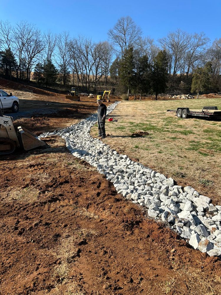 Enhance your outdoor space with our expert hardscaping services, including patios, walkways, and retaining walls. We create durable and aesthetically pleasing solutions tailored to complement your home perfectly. for Quality Excavating in Seymour, TN
