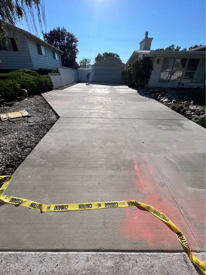 Our Driveways Approaches service provides homeowners with professionally designed and installed concrete driveways that are built to last, enhance curb appeal, and increase the value of their property. for Solano's Construction in Salt Lake City, UT