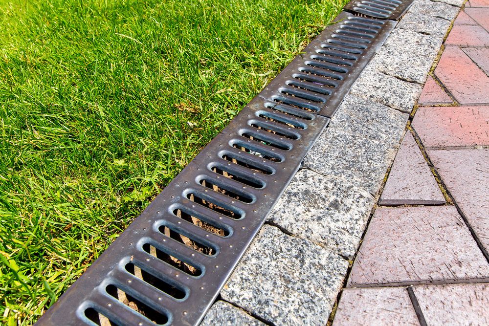 Our Drainage Installation service ensures proper water flow to prevent flooding and erosion on your property. Trust us to design and install efficient drainage systems tailored to your landscaping needs. for AW Irrigation & Landscape in Greer, SC