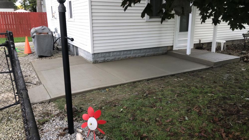 Enhance your home with our expert sidewalk installation service, providing durable, aesthetically pleasing concrete pathways designed to complement your exterior and ensure safety, longevity, and curb appeal for any property. for Harder Than Concrete in Indianapolis, IN