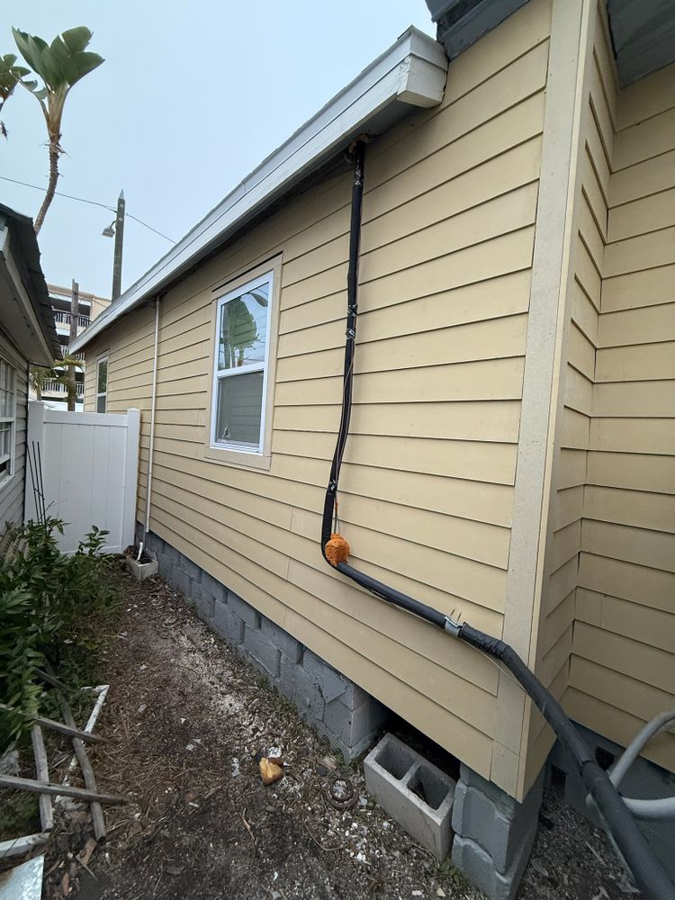 Hardie Siding Installation for Escorpio Painting in Tampa, FL