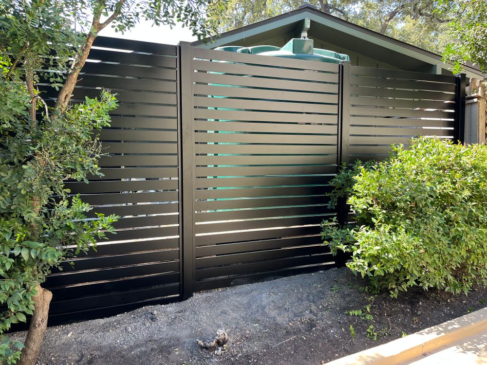 Sleek Fence  for Espinoza Landscape & Construction  in San Antonio, TX