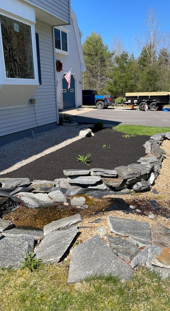 Transform your outdoor space with our natural stone hardscape service, creating a unique and durable landscape that enhances beauty and functionality while seamlessly blending with the surrounding environment. for Deering Ridge Landscaping in Waterboro, ME