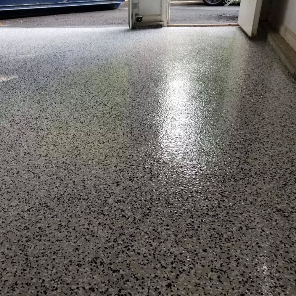 Transform your garage with our durable and stylish epoxy floor coatings, offering a seamless finish that resists stains, enhances safety, and adds aesthetic appeal to increase the value of your home. for Epoxy Everything in Latham, NY