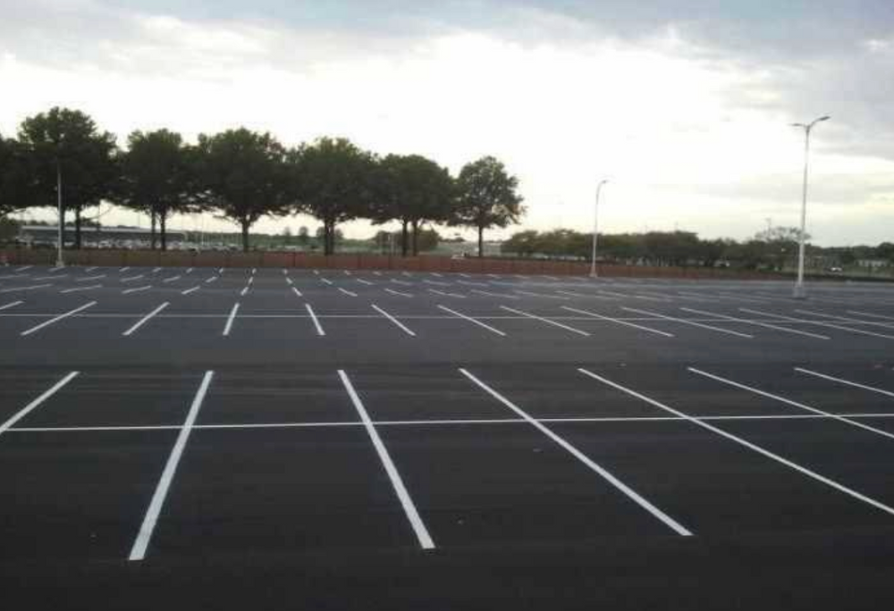 Enhance your property's curb appeal and safety with our professional line striping service, ensuring precise, durable markings for parking lots, warehouses, or sport fields. for The Lot Doctor in Seminole County, OK