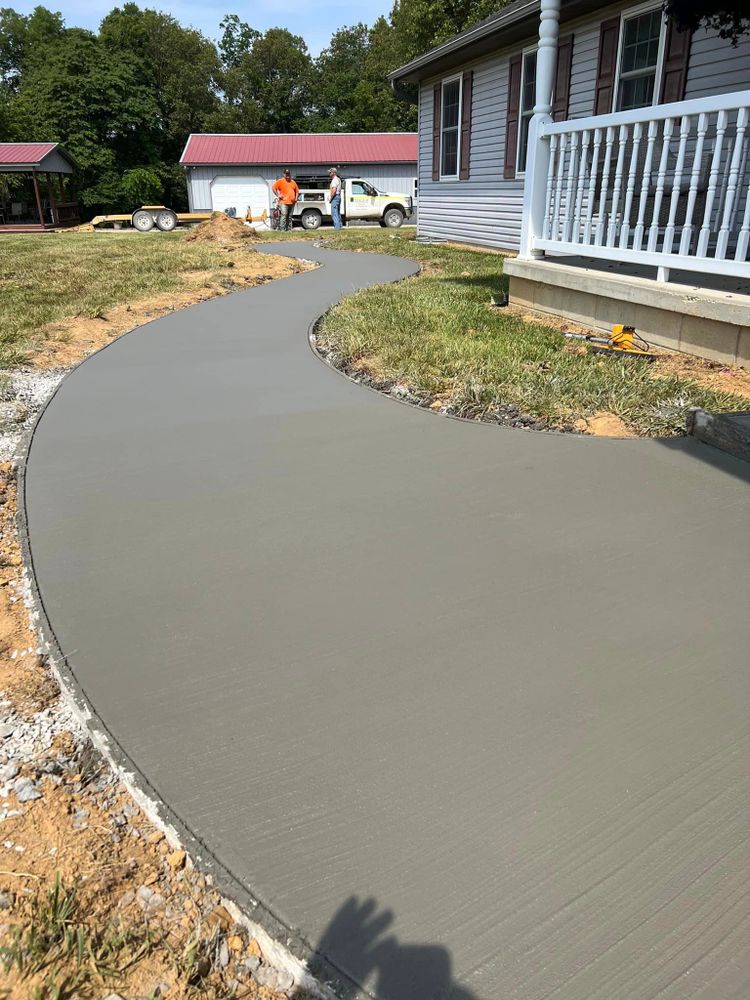 Our Concrete service offers durable and stylish solutions for driveways, patios, and walkways to enhance the aesthetics and functionality of your home's exterior space with professional craftsmanship. for View Point Construction in Huntingburg, IN