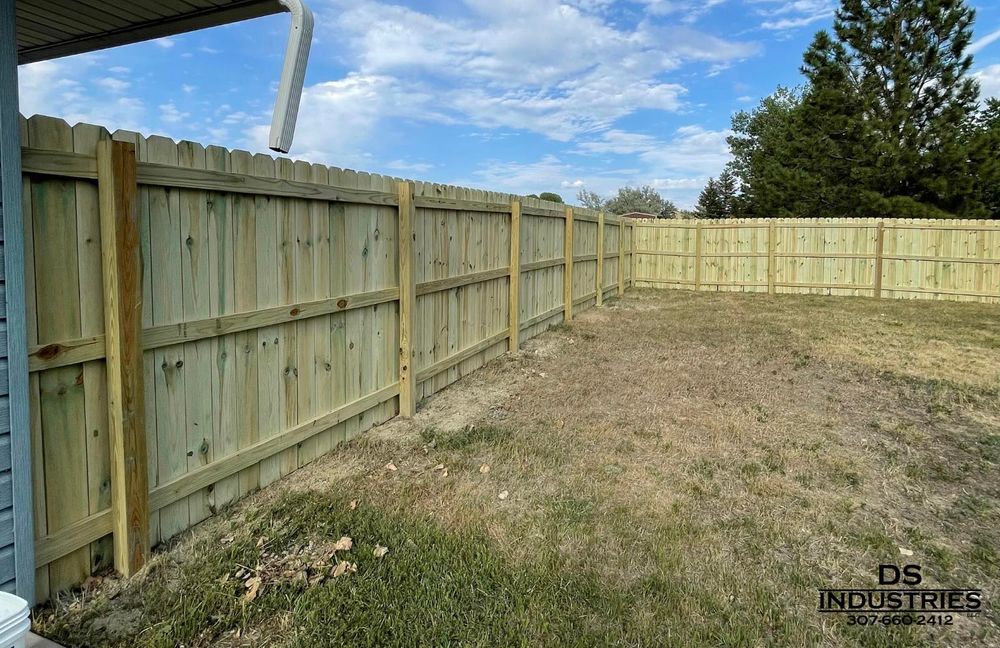 Our professional fence installation service ensures durable, secure, and aesthetically pleasing fences tailored to your property's needs, enhancing privacy and curb appeal while using high-quality materials for lasting satisfaction. for DS Industries LLC in Gillette, WY
